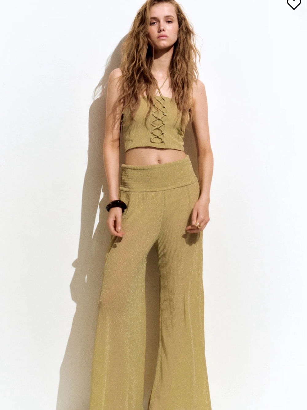 A Set of Wide-Leg Glittery Smocked Pants and Lacing Detail Halternek .